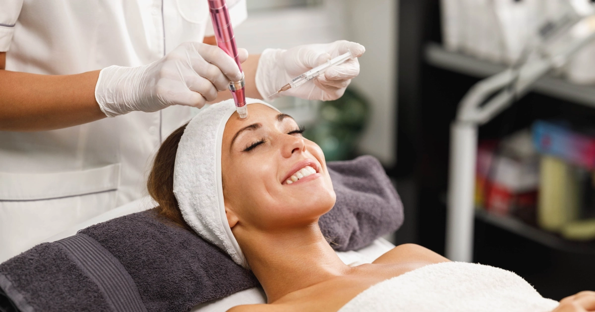 Close-up of a woman receiving an ultrasonic facial treatment and Microneedling in Wilmington, NC at a spa.